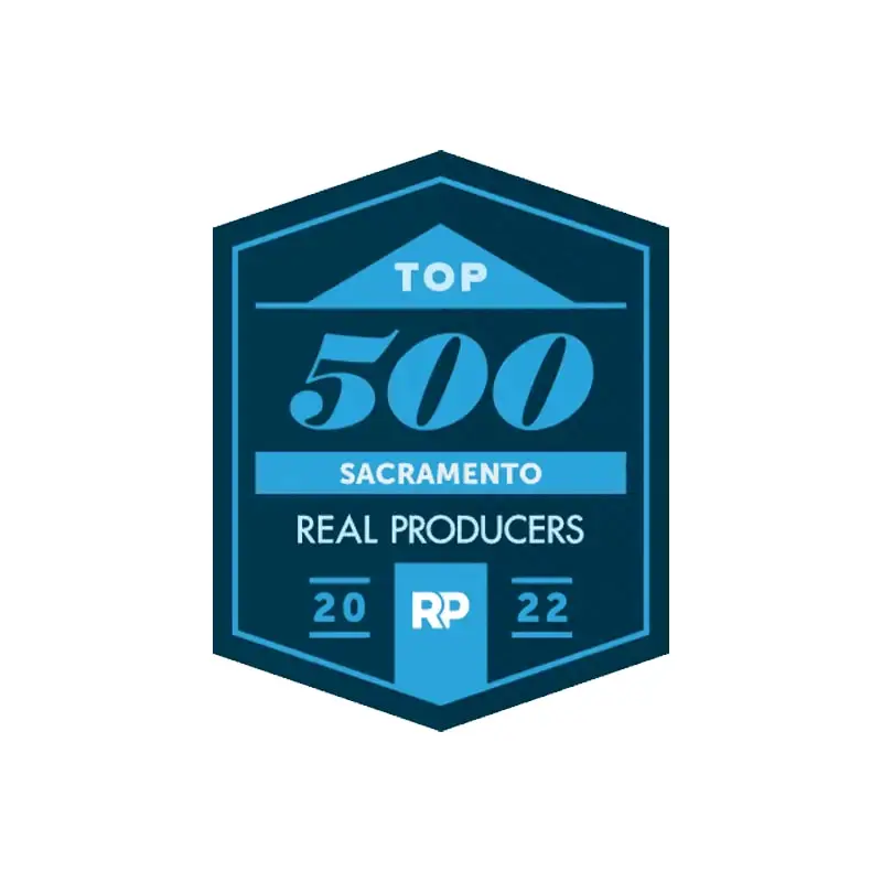 A badge that says top 5 0 0 sacramento real producers